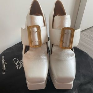 Fluevog Munster Elektras in white. Size 11.